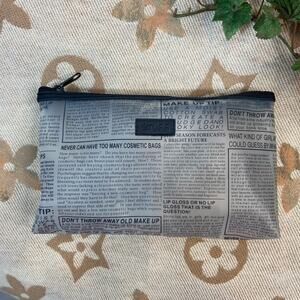 PACKITS BY RGA Makeup Pouch Toiletry Bag "STUFF" Newspaper Design Subliminal